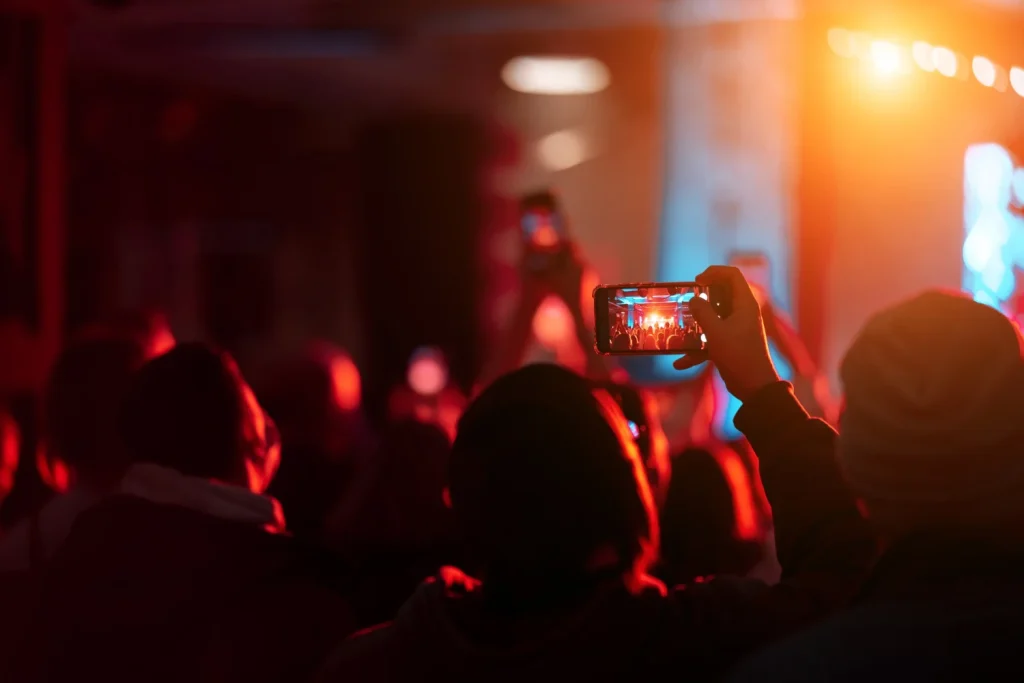 guy engaging with concert guy engaging with concert